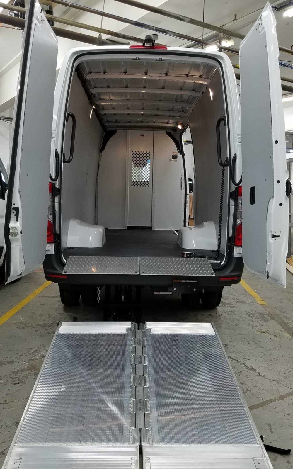 Advantage Outfitters Showcase Upfits Vertical van with lift ramp