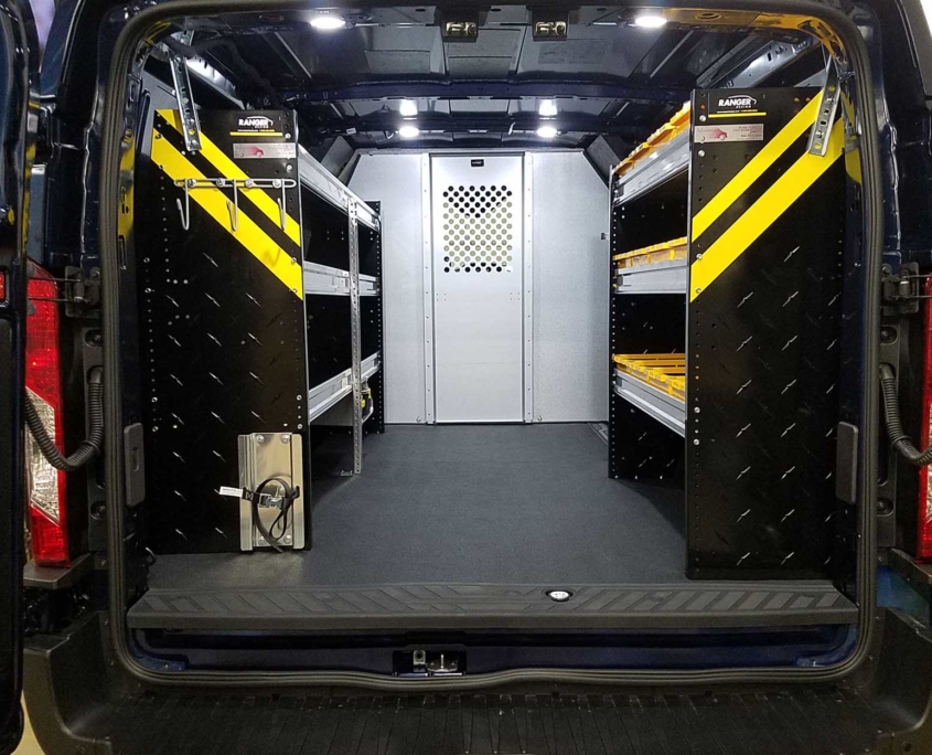 Advantage Outfitters Showcase Upfits van with black shelves and bins
