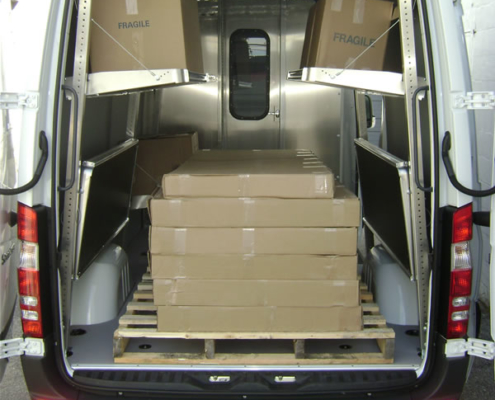 A work van with shelves that fold up