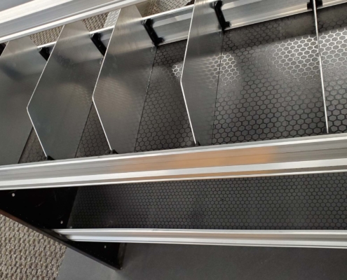 Double height shelf dividers installed in a work van