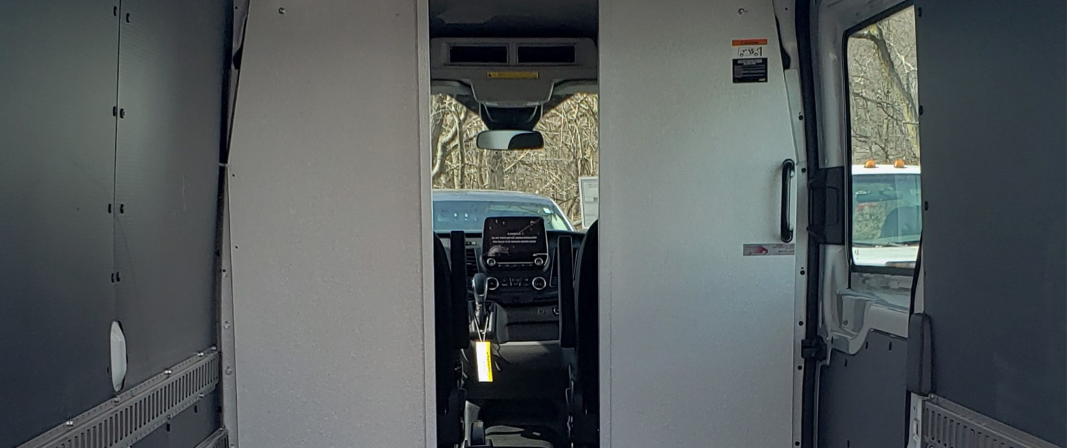 Pass-thru partition in a work van