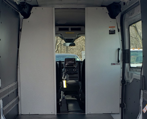 Pass-thru partition in a work van