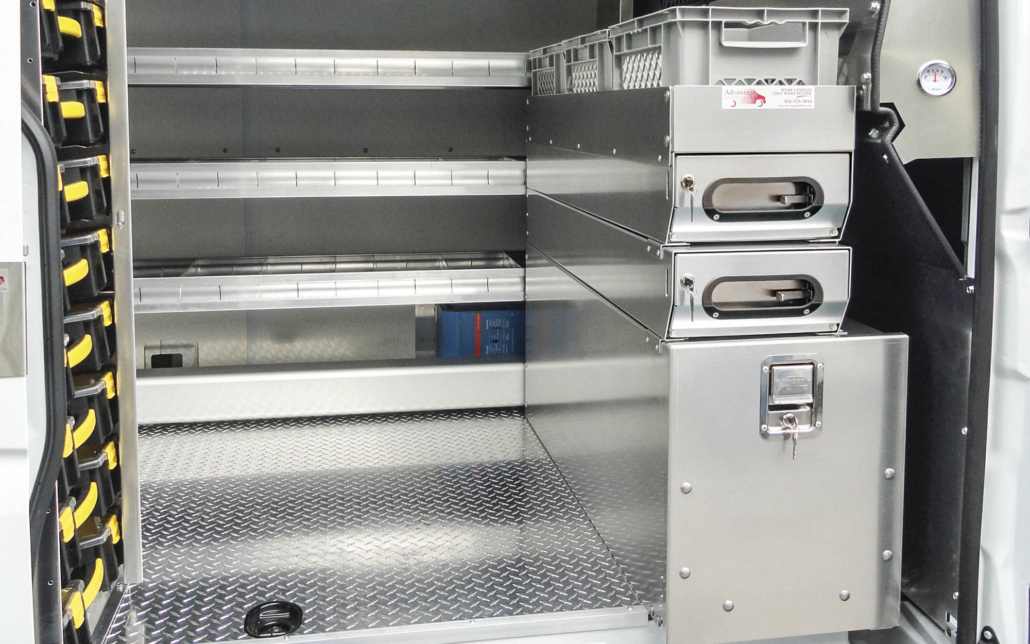 Tool drawer, parts drawers, top tray, and crates installed in a work van