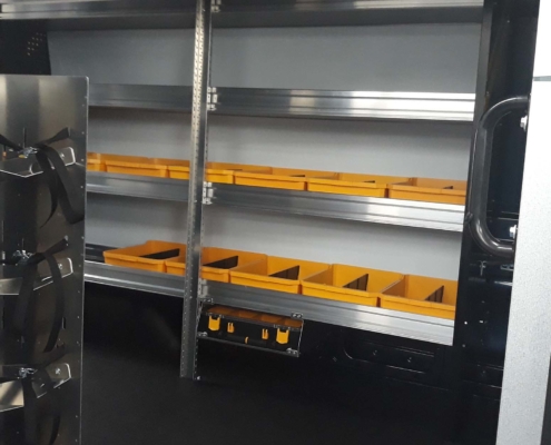 Single underslung partskeeper unit installed in a work van
