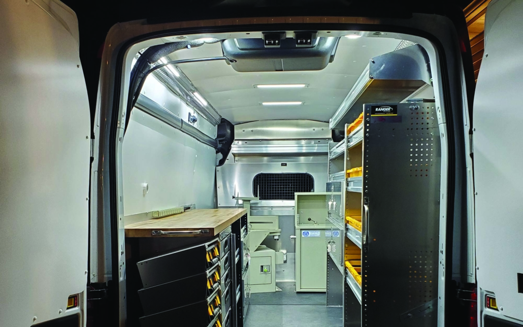 Outfitted van with shelving and lighting