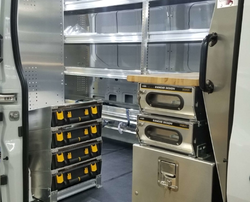 picture of a van upfit with shelving and drawers