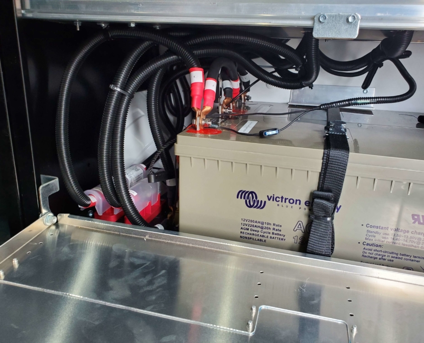 A van upfit with dc/ac power systems